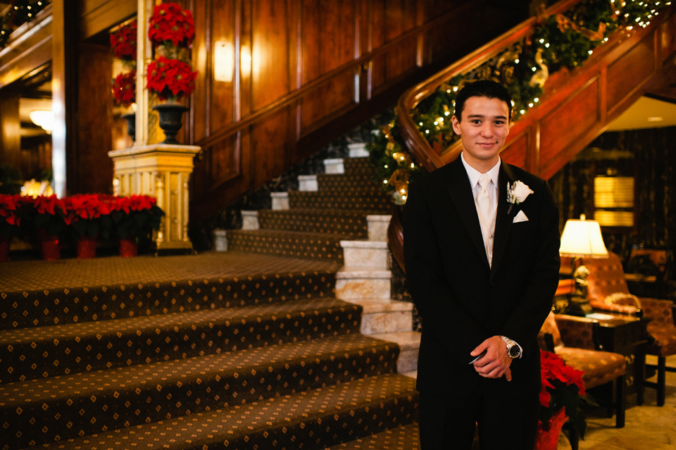 groom waiting on the stairs