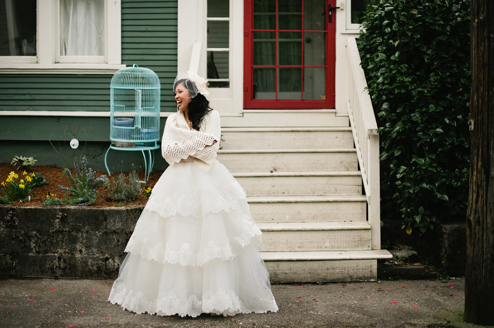 bride in front of her house