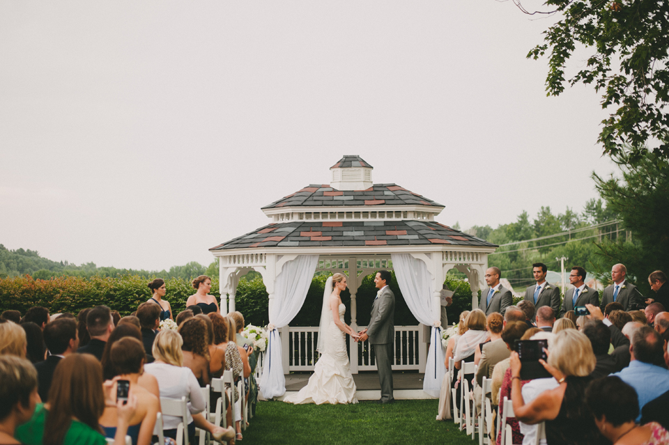 wedding ceremony at the red barn