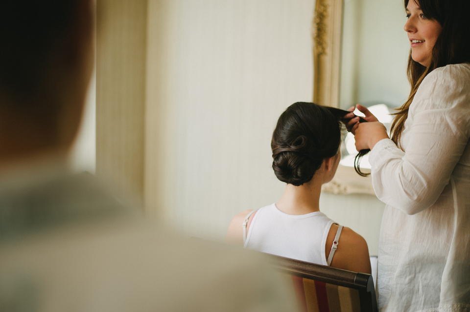 bride getting hair done at the benson